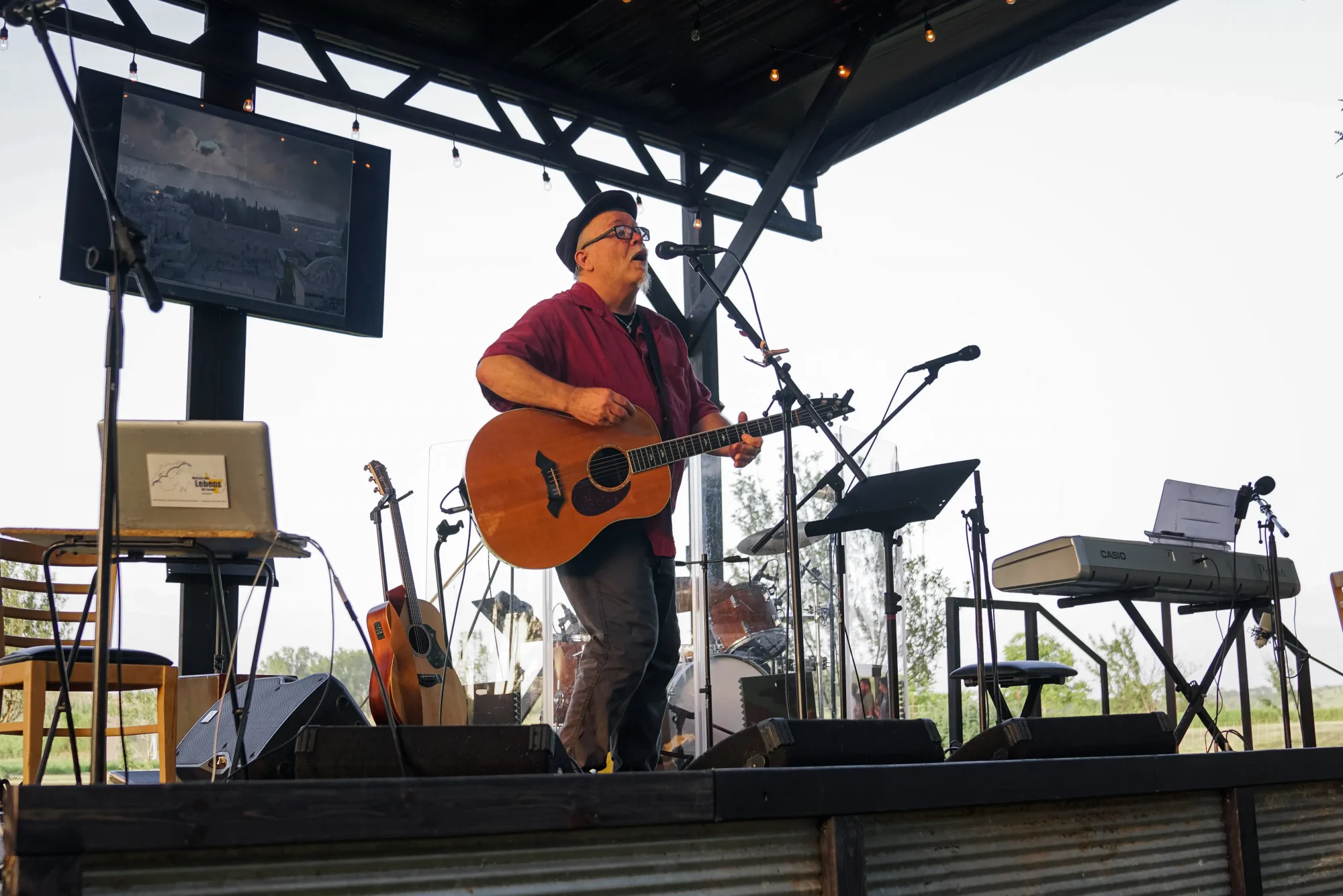 Ted Pearce playing guitar at Proclaim 2022